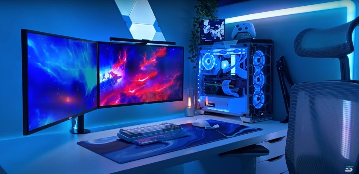 A small-space gaming setup with blue and white lighting.