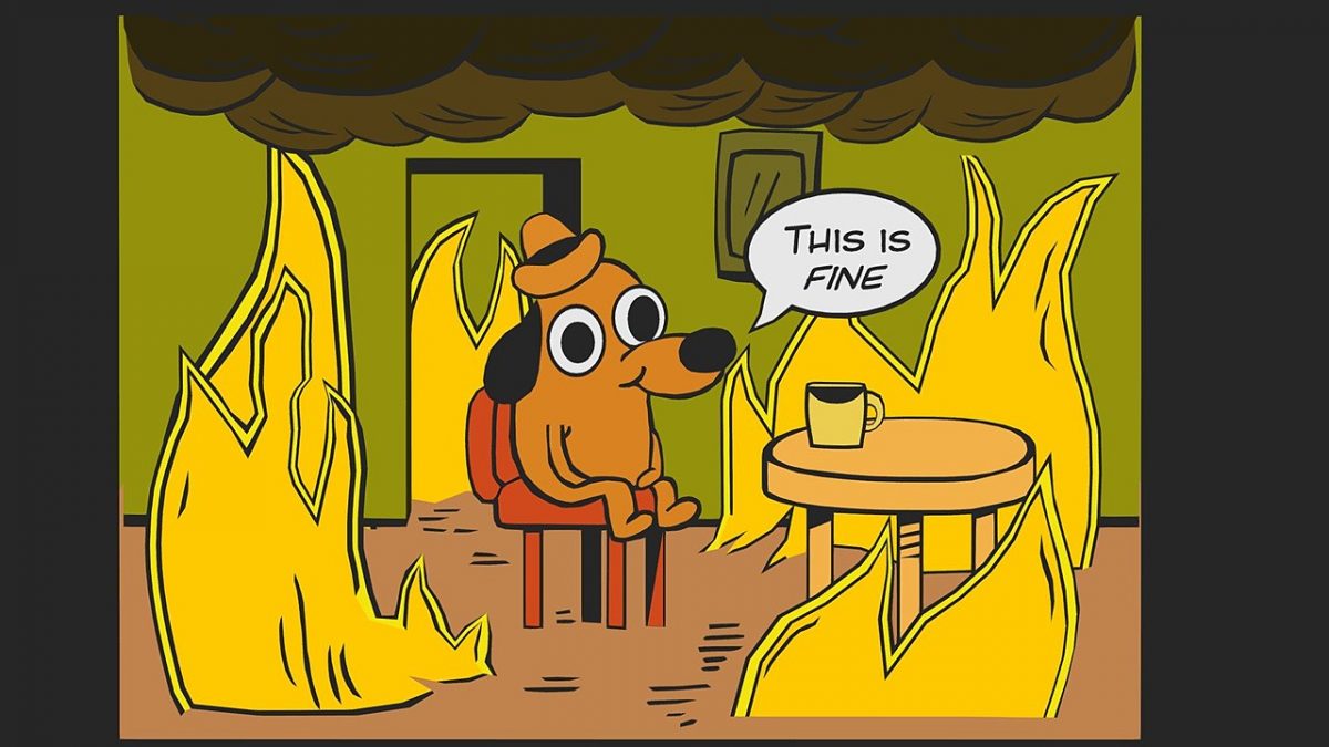 Cartoon dog having coffee while everything around him burns.