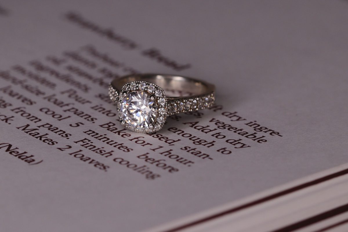 White gold halo-style diamond engagement ring 