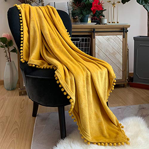 Cozy Flannel Blanket with Pompom Fringe