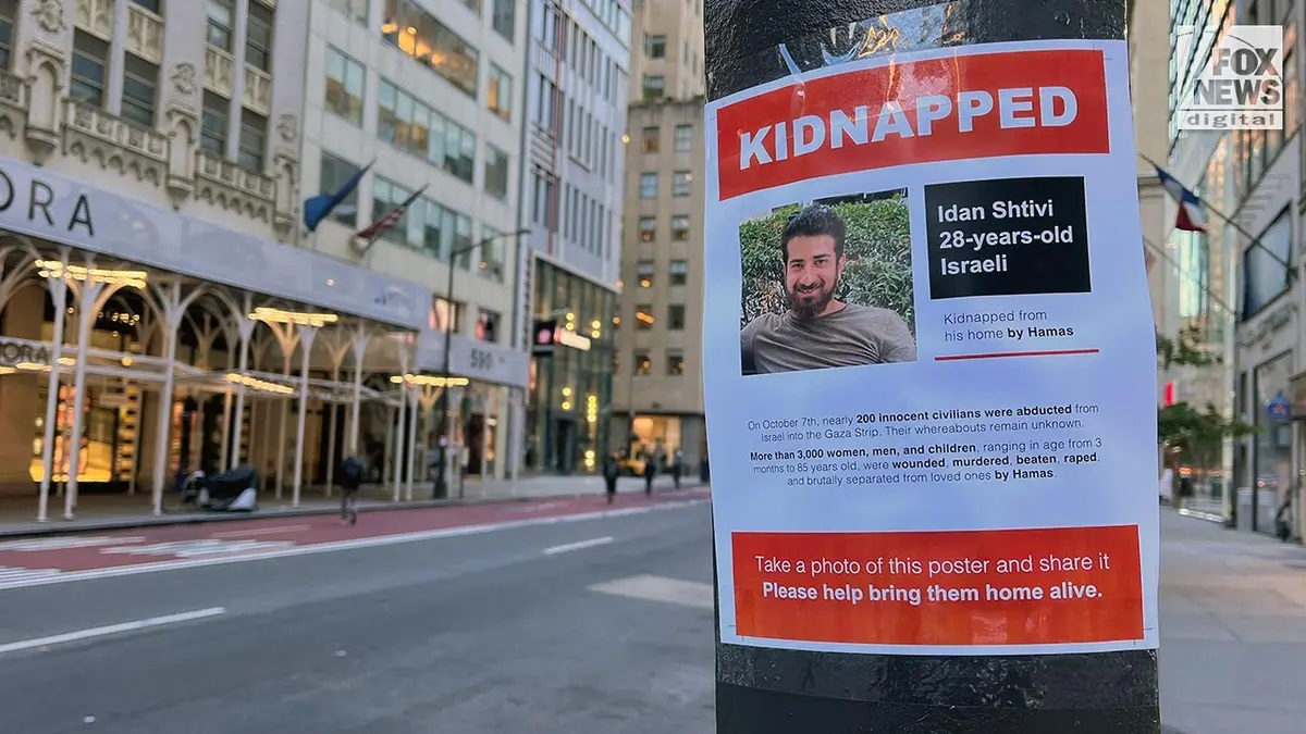 Fitness Trainer Sparks Controversy By Tearing Down Kidnapped Israeli Kids Poster