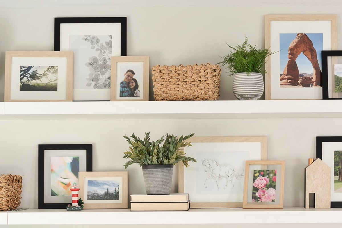 How To Arrange Picture Frames On Shelf
