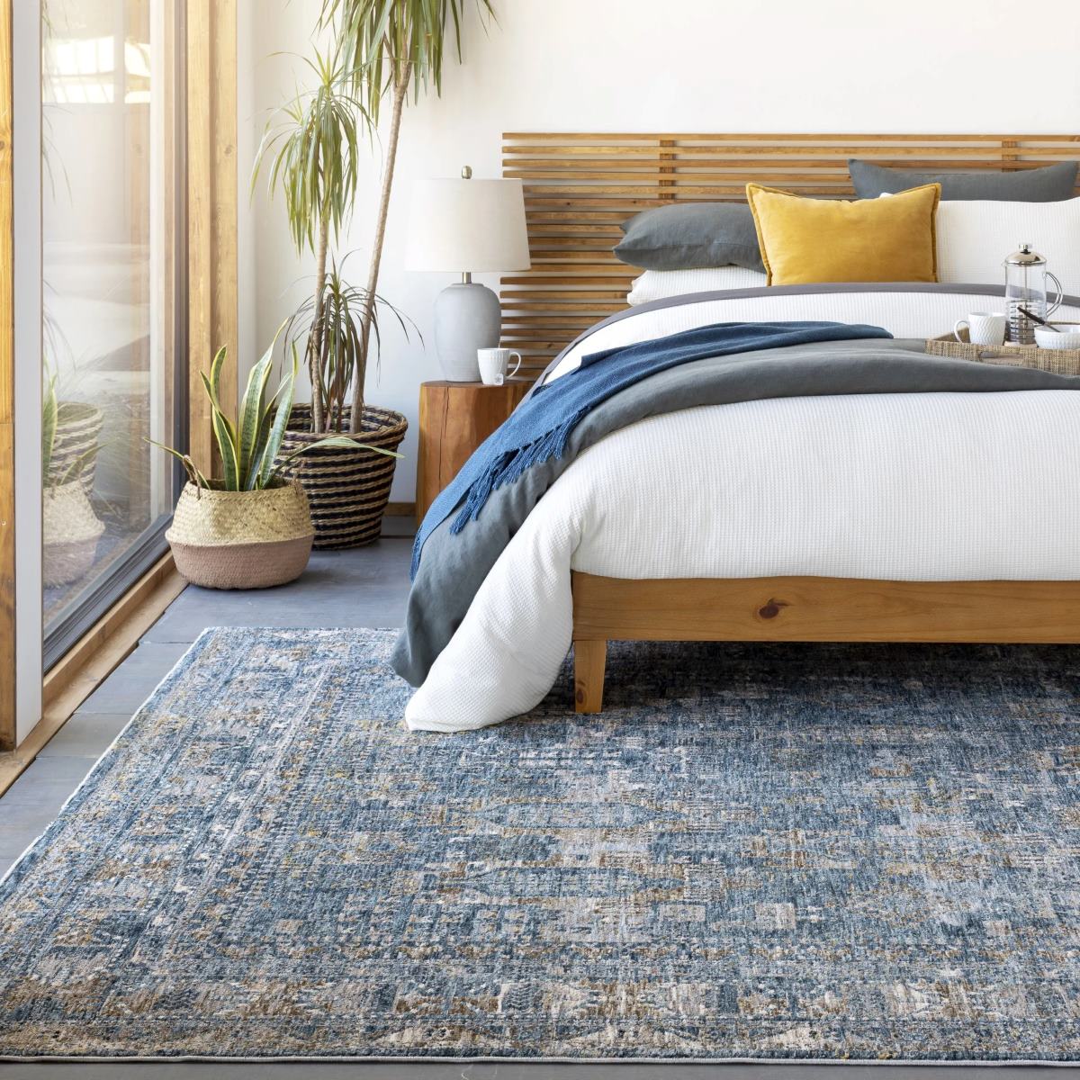 what-size-area-rug-under-a-queen-bed