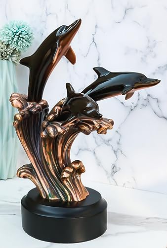 Bronze Dolphins Riding Over Ocean Waves Figurine