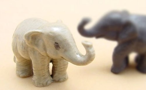 Tiny Ceramic Baby Elephant Figurine