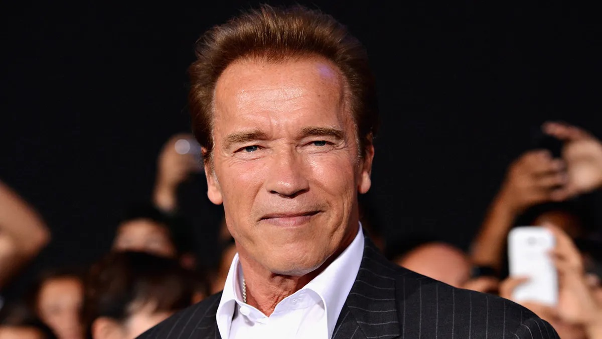 Arnold Schwarzenegger Plays Musical Cupid For Matt Iseman’s Proposal