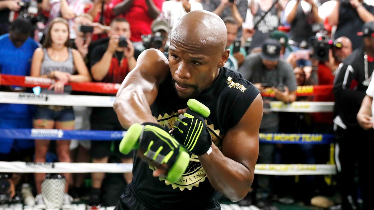 Floyd Mayweather Mourns The Loss Of His Assistant, Kitchie Laurico
