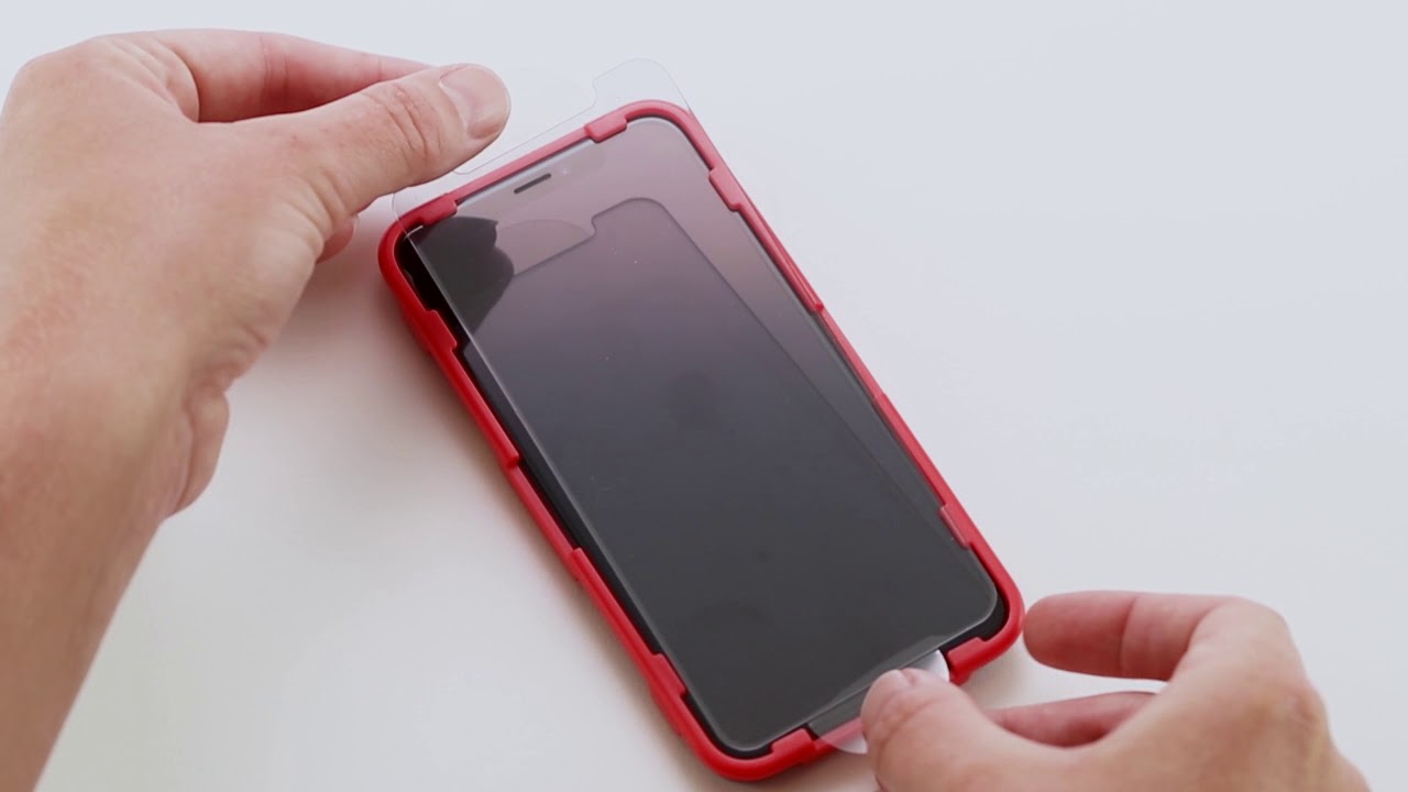 screen-protection-installing-zagg-invisible-shield-on-iphone-13